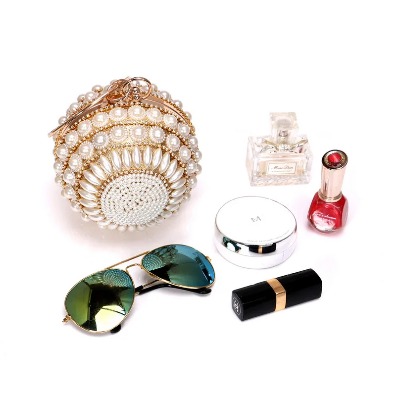 The new ball design with rhinestone paste is suitable for large banquet party hand bag clutch bag evening metal bag