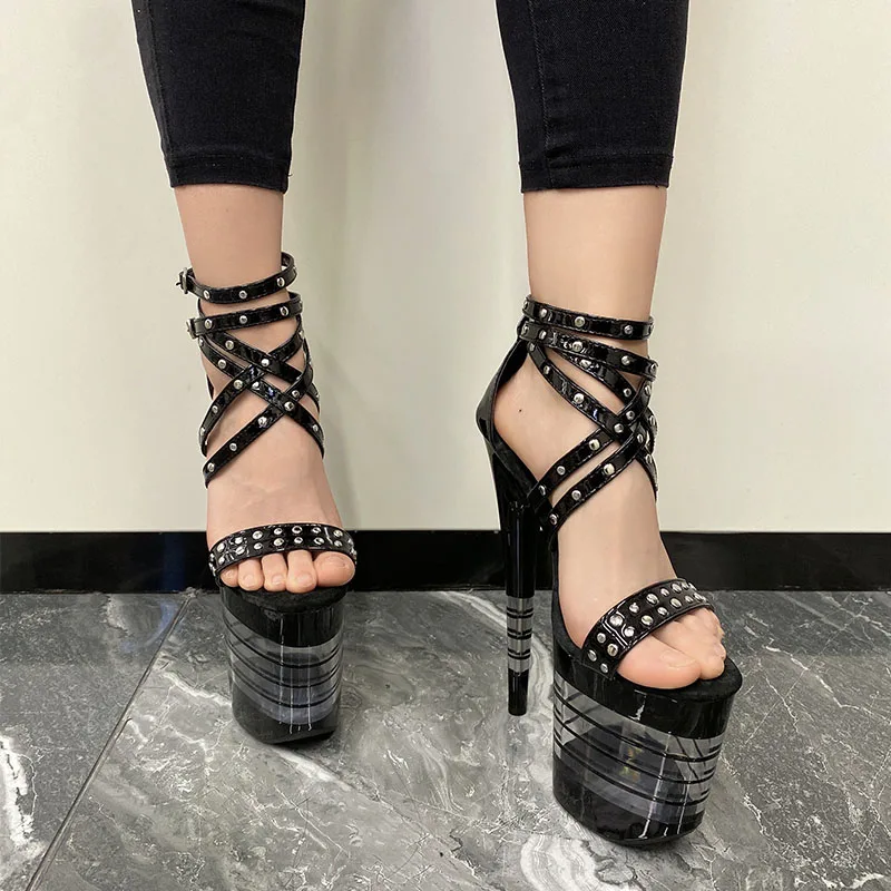Xinzirain Women Custom Lace Up Metal Patent Leather Pole Dance Heeled Sandals Platform Stripper Heel With Glitter Strings Logo