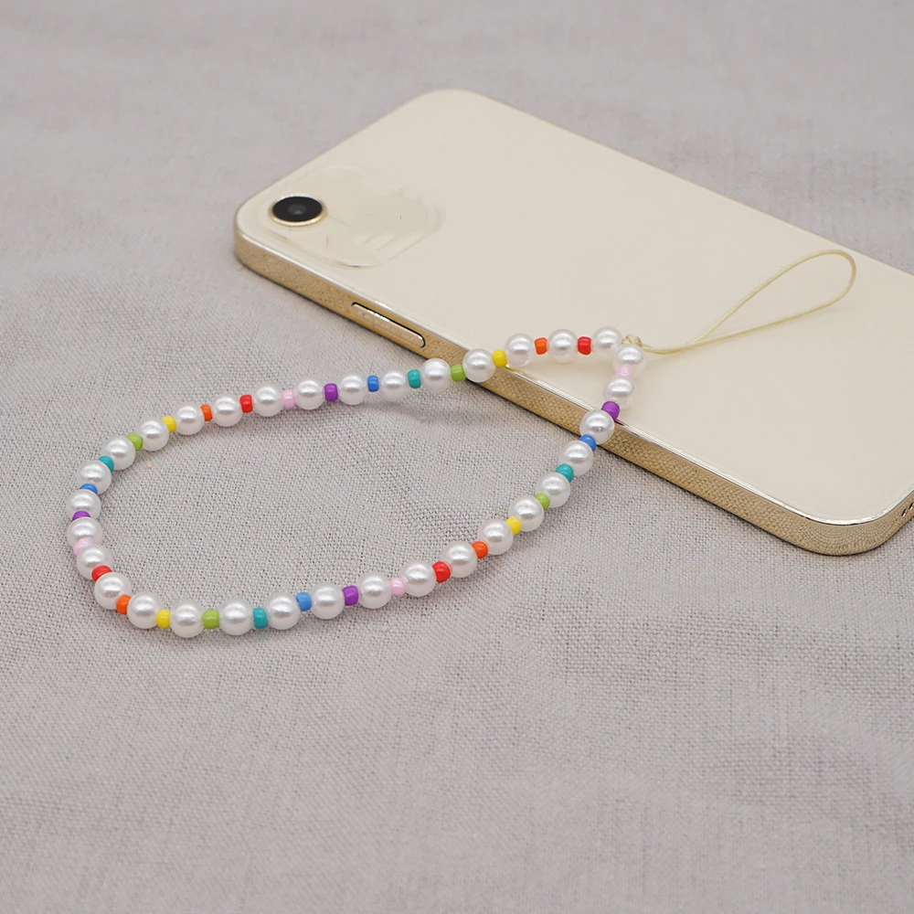 Dvacaman Модный корейский держатель для мобильного телефона с жемчужинами цветные бусины ремешок для телефона Очаровательная Ручная работа защита от потери на запястье на лето