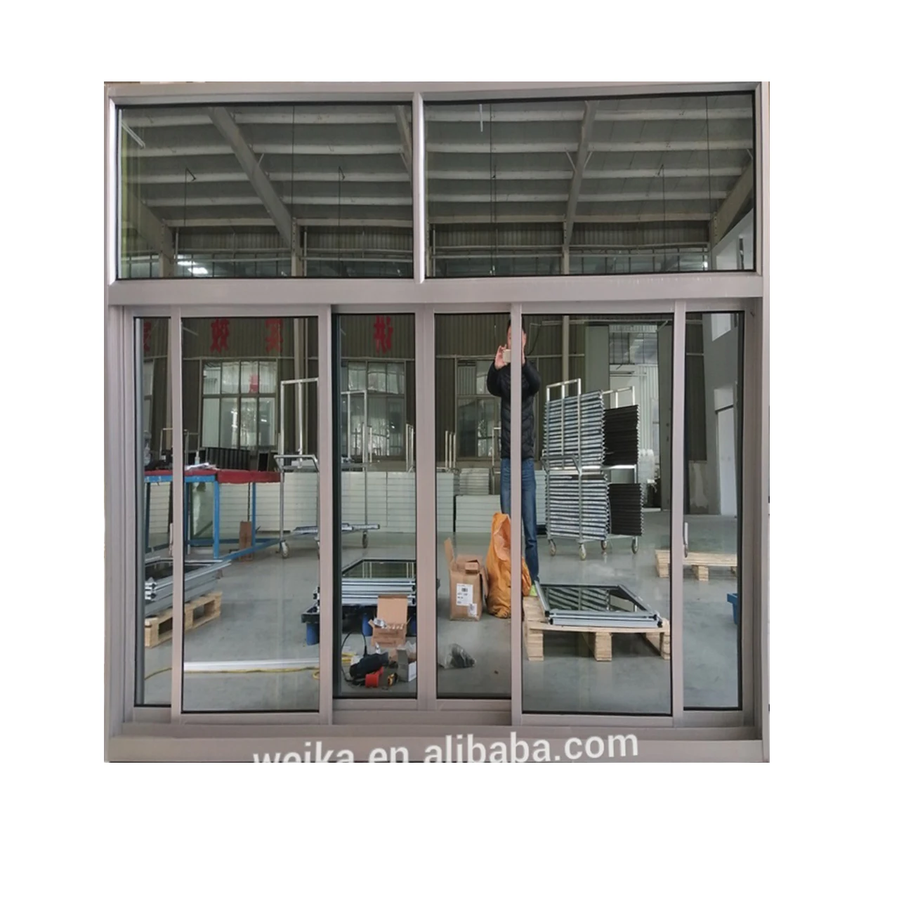 Large double glazed tempered glass floor to ceiling windows and sliding doors for balcony patio