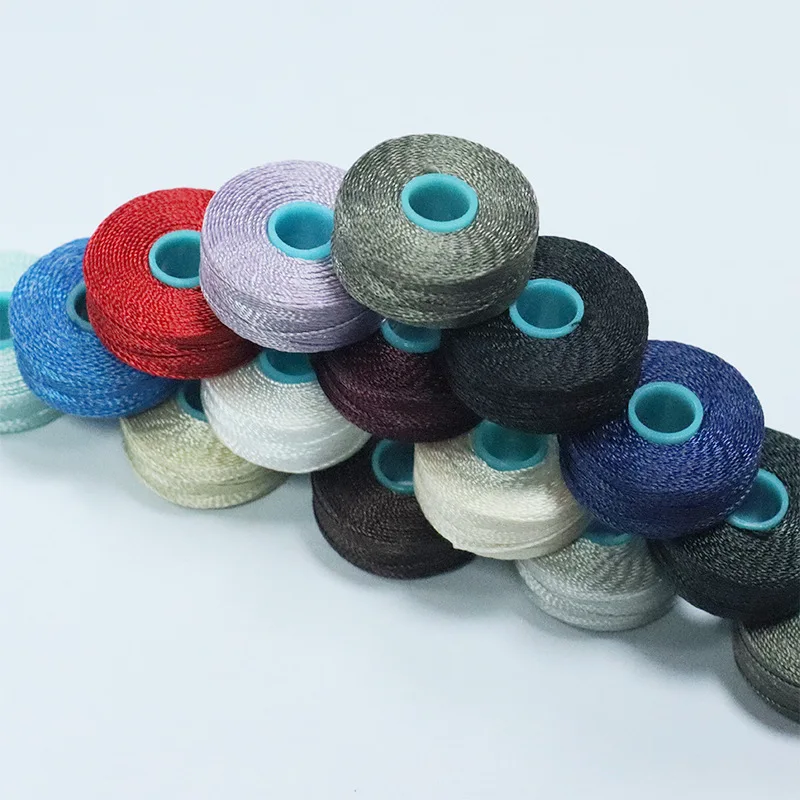 Заводские цены цвета 30 #210D/3 Tex70 высокая прочность L-стиль 100% нейлоновые предварительно намотанные бобины швейные нитки с меньшими боками