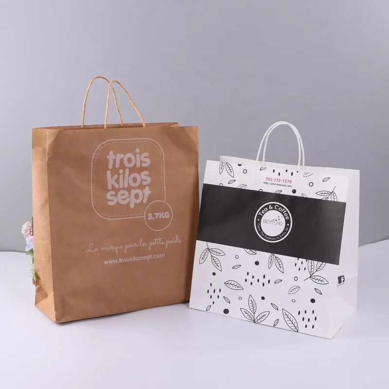 Handheld paper bags printed with logos in clothing stores, advertising, packaging, shopping, wholesale of paper cowhide bags