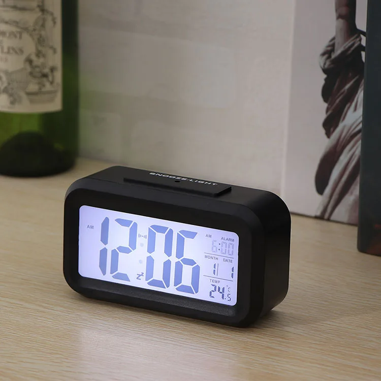 Battery Digital Alarm Clock Large LCD Display Light Sensor Night Light Snooze Table Clock
