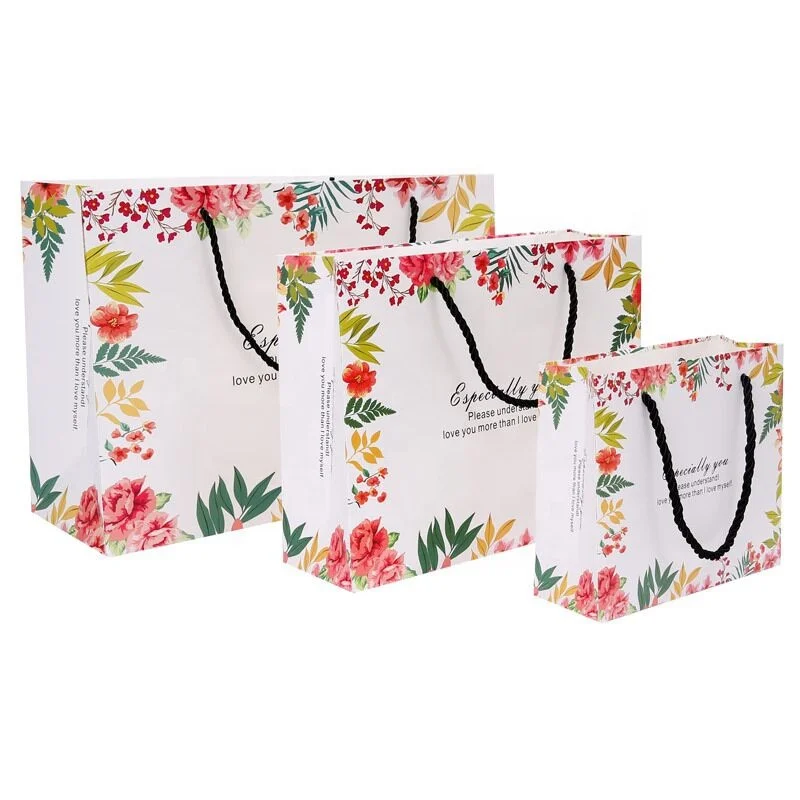 Wholesale custom printed luxury shopping gift paper bag with handle