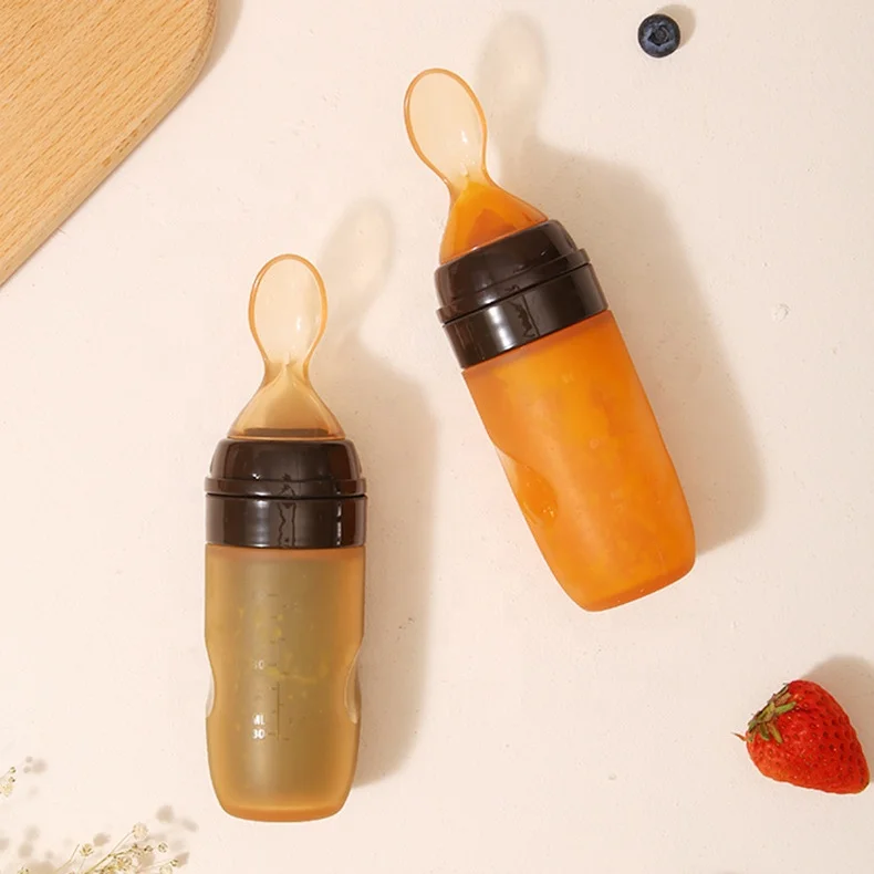 New Design Baby Spoon Squeezing Bottle Feeder Food Grade Silicone BPA Free Toddler Spoon Feeder