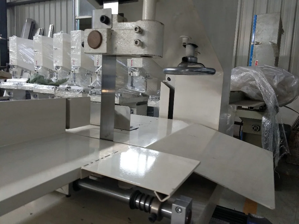 
Low cost paper machine toilet paper band saw cutter 