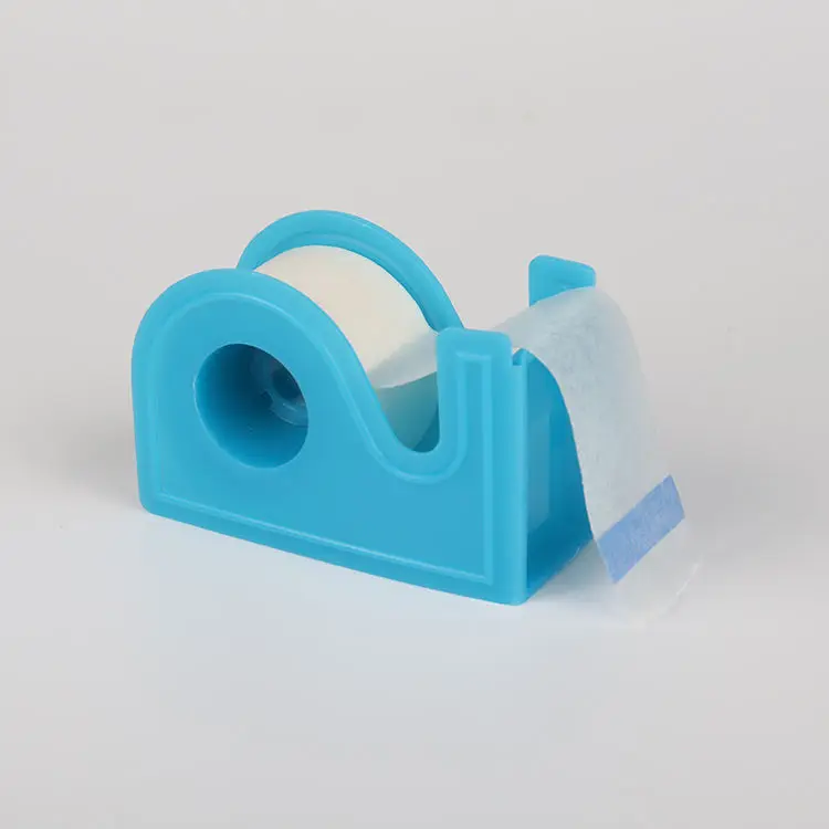 White skin color Adhesive Surgical Microporous Non Woven Paper Medical Non woven Tape with dispenser cutter