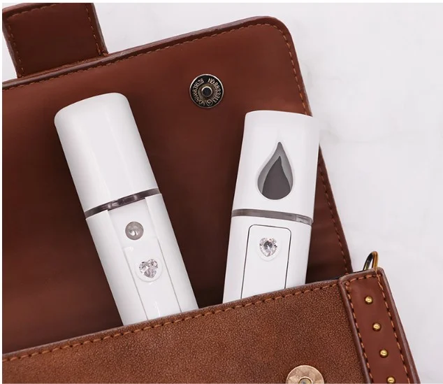 Hot sale beauty care portable Nano steamer hand facial mist sprayer beauty