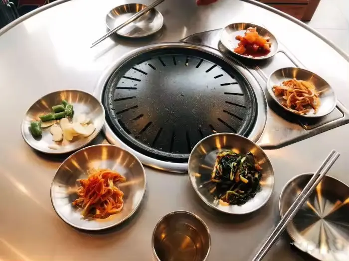 Customization hole sizes gas grill round bbq table Stainless steel restaurant barbecue table korean bbq grill table with stool