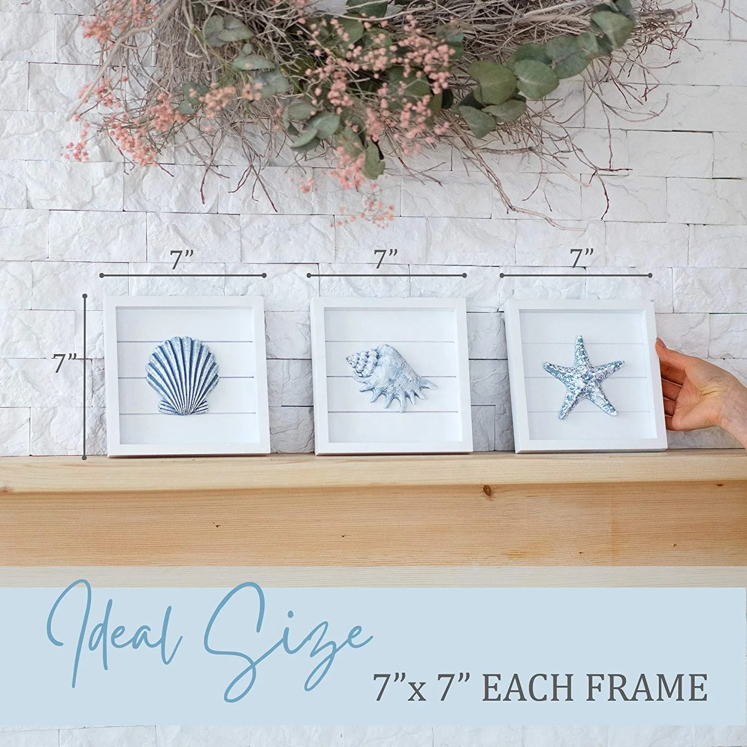 Beach wall decorated with blue shells and starfish, 3 white wooden frames, suitable for bathroom or coastal bedroom, home