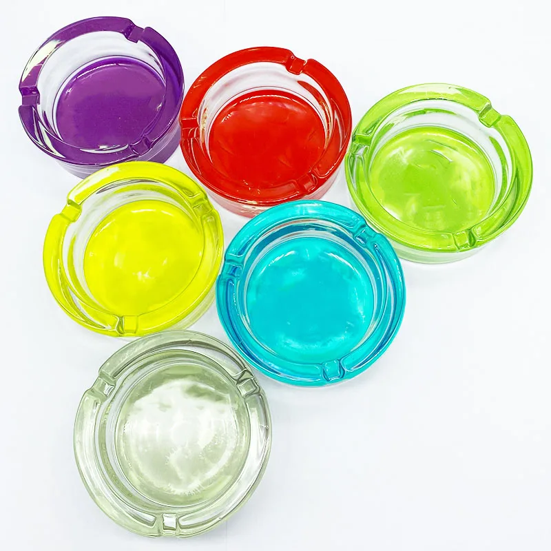 
Factory direct sales custom logo Glass ashtray round ashtray with mouth cartoon stick Fluorescent smoking ashtray 