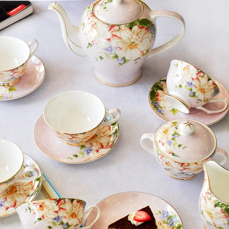 pink color with  flower and gold line  good quality bone china coffee tea set