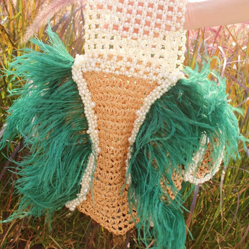 
2020 new vacation style full handmade pink ostrich feather pearl beads clutch bag natural grass weaving bag straw tote bag 
