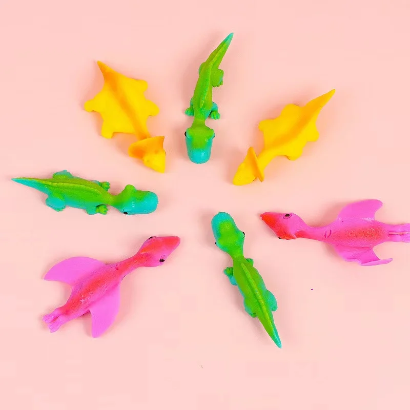 Novelty Funny rubber animal Dinosaur Slingshot finger flying toy Stretchable elastic soft shooting toy