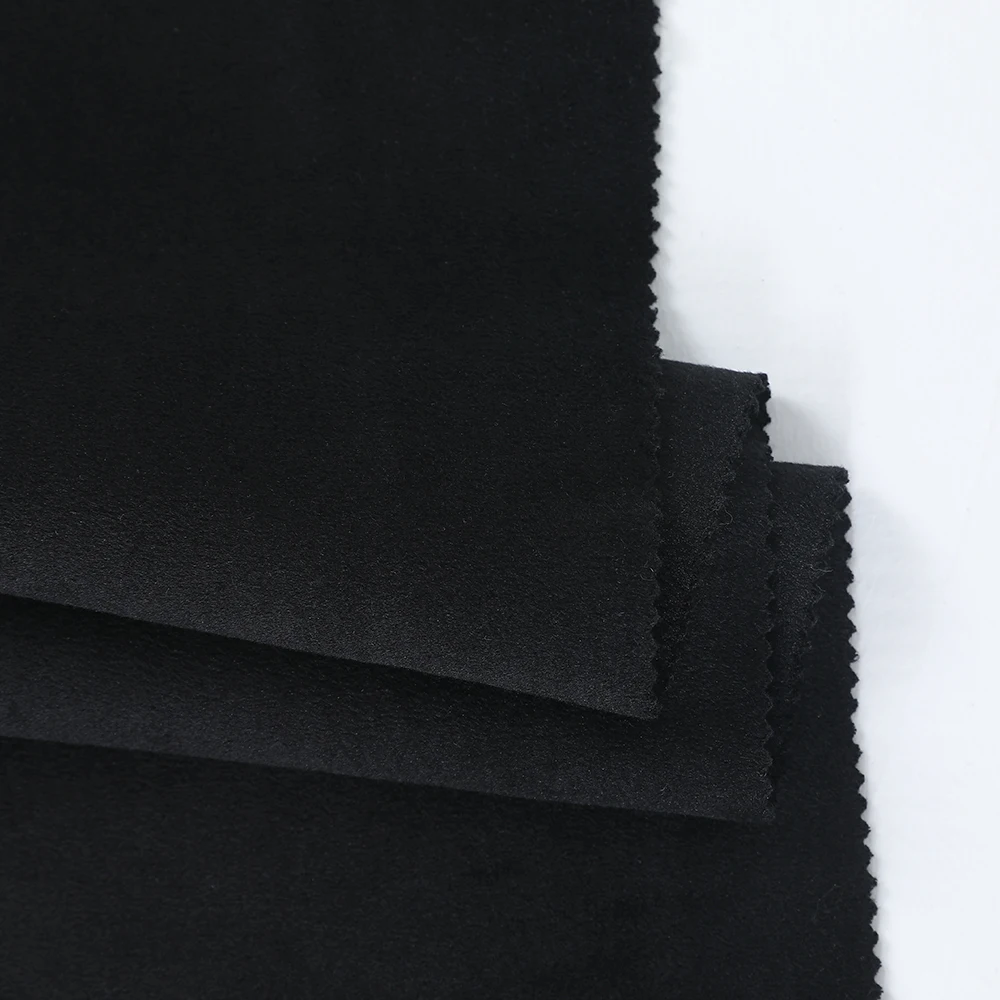 
Xin Wo Textile Faux Fur Fabric Long Pil Super Soft Brushed Polyester Fabric For Winter 