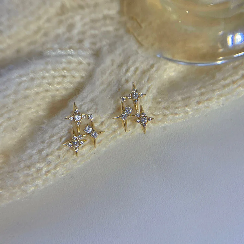 Diamond-studded star earrings Female silver needle niche design sense of high-grade temperament simple cold wind cross star