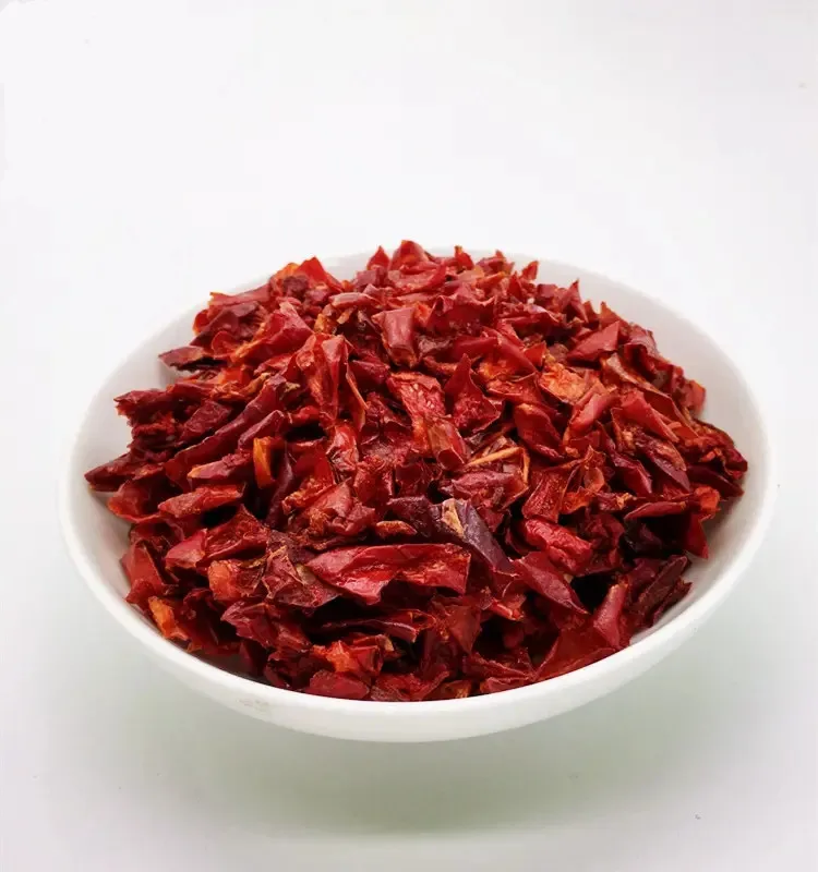 Mature, air dried red sweet bell peppers flakes diced for soups