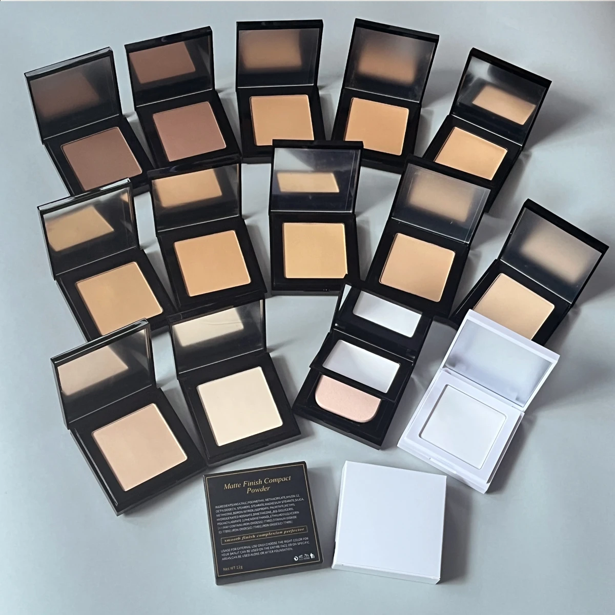 Wholesale low moq dark light shades long lasting face body makeup pressed face powder private label