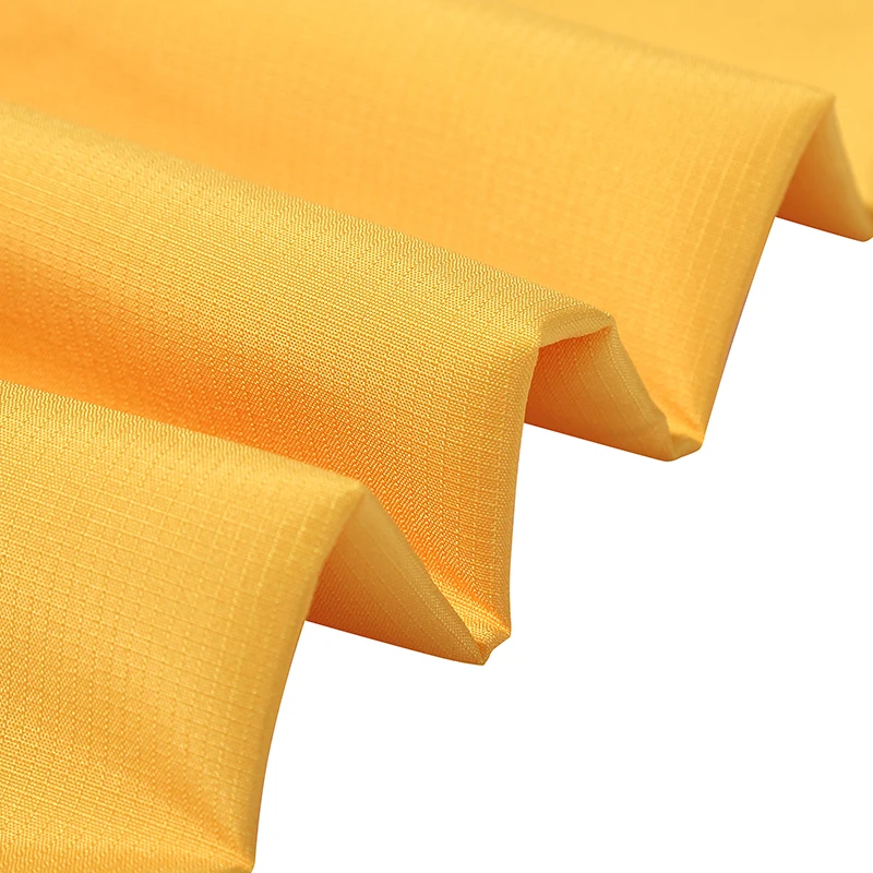 hot sale 100% polyester ribstop waterproof 0.2*0.15 peach skin ribstop pongee woven fabric