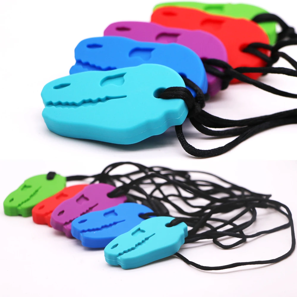 Wholesale Soft Food Grade Baby Toys Bpa Free Silicone Baby Teether Kids Autism Silicone Sensory The Dinosaur Head Chew Necklace