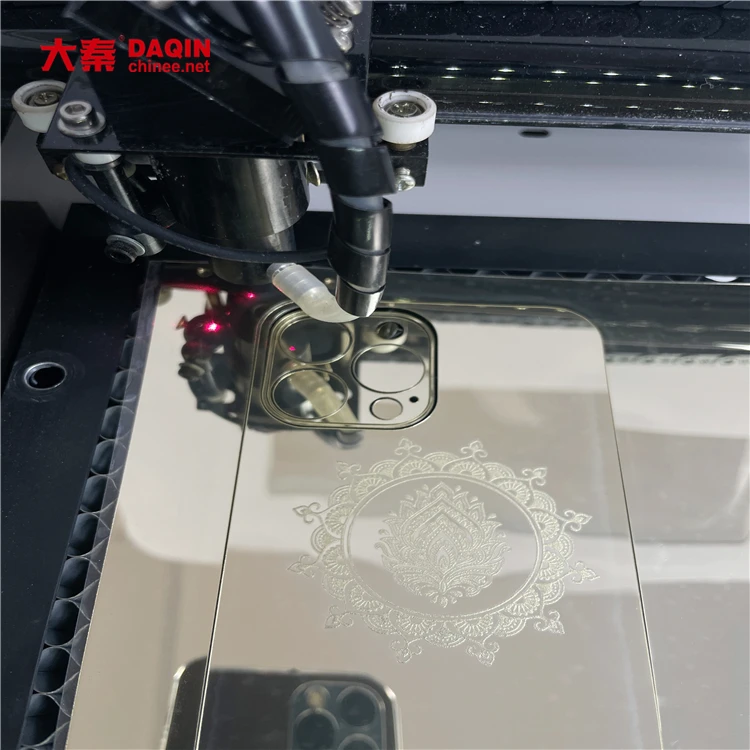 cut Gold engraved back skin by daqin laser screen protector Cutting machine