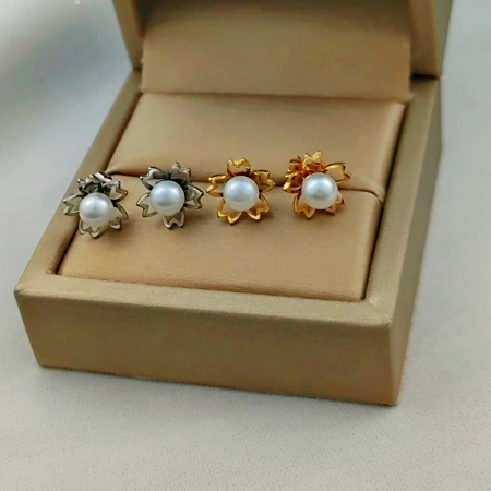 Imitation pearl earrings female hollow flower simple design high-end fashion temperament female ear jewelry