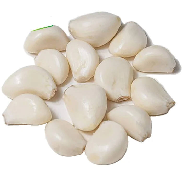 Свежие очищенные чесночные гвоздики оптом