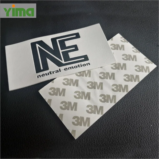 Custom LOGO jeans hat PU label tag embossed stamp printing jeans real leather label patch with metal for clothing