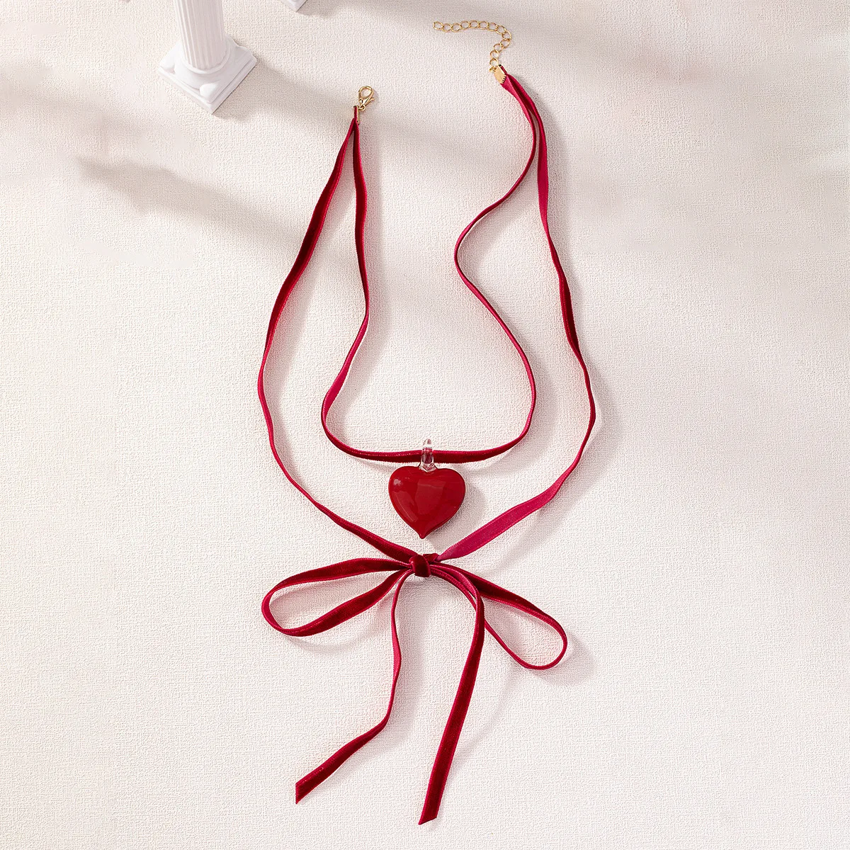 Женское колье-чокер с бантом