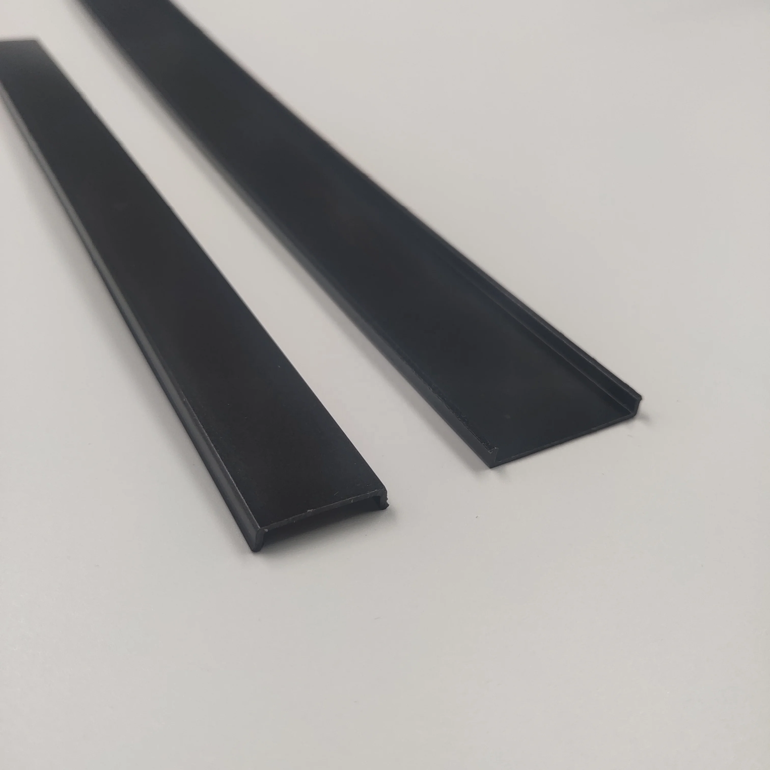 New plastic extrusion as frosted lens for linear lighting match of the platform matte dark black lens finished