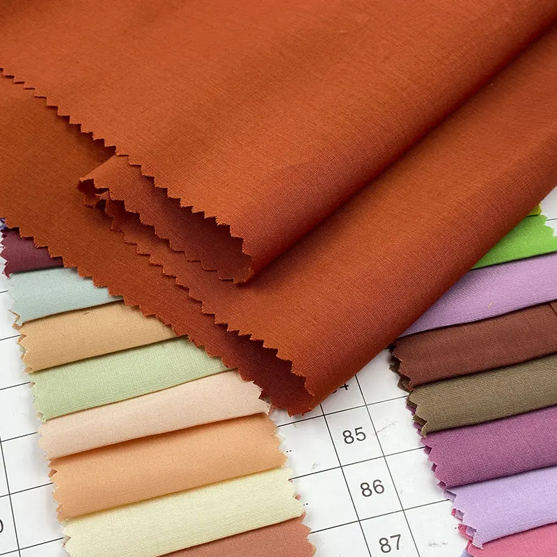 China woven factory weave high density cupro loose-fitting track copper imitation ammonia plain dyed 60% rayon 40% poly fabric