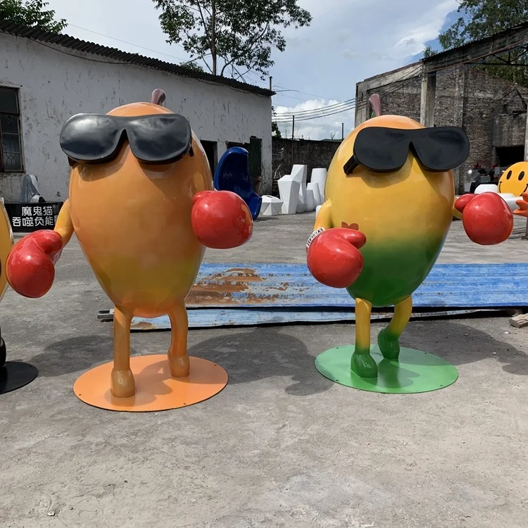 A cartoon sculpture of a glass fiber reinforced plastic mango Fruit model ornaments Outdoor cartoon  Resin fiber figuresculpture