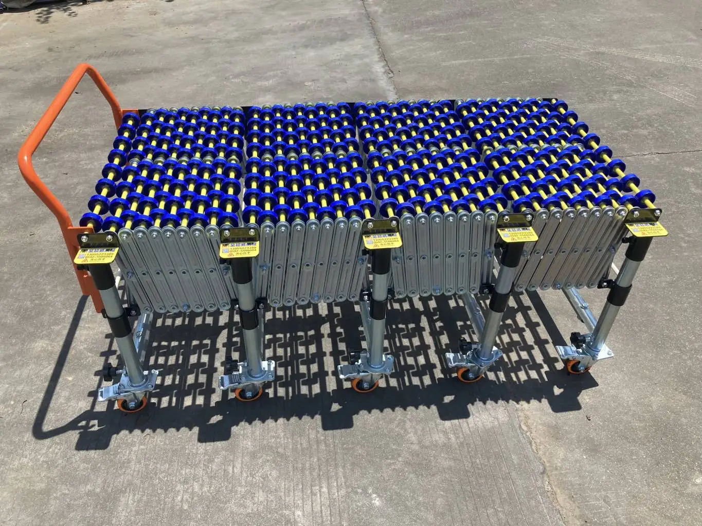 Unloading conveyor Plastic wheel manual gravity expandable roller conveyor