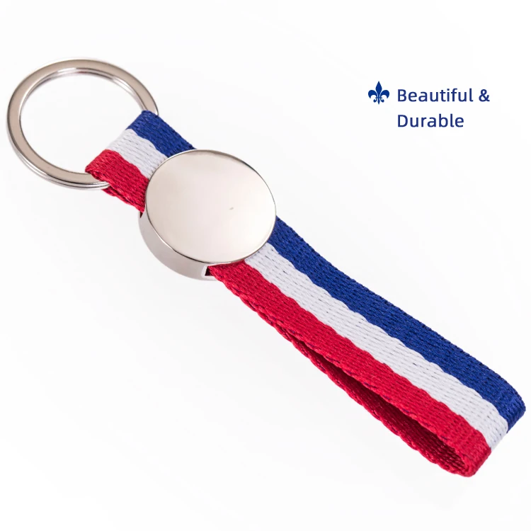 Hot Sale Twill Fabric Customized Own Trademark Merrow Border Flash Plain Embroidery Keychains for Clothing