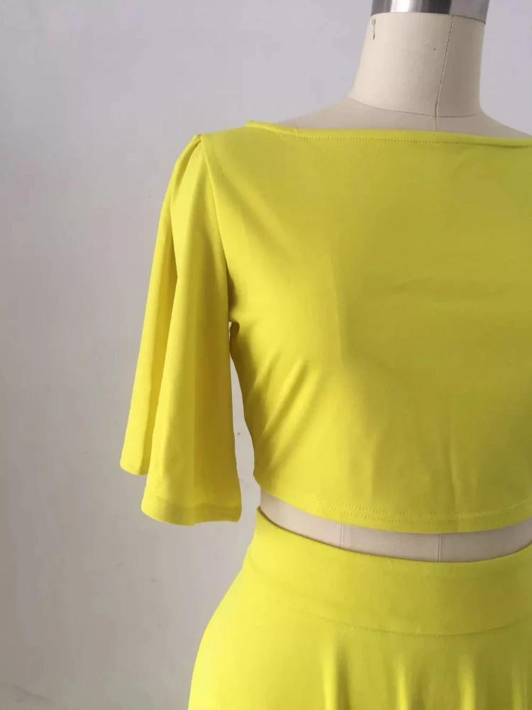 Fashion yellow two-piece suit summer ladies one-shoulder sleeve short T-shirt + big swing mopping skirt suit