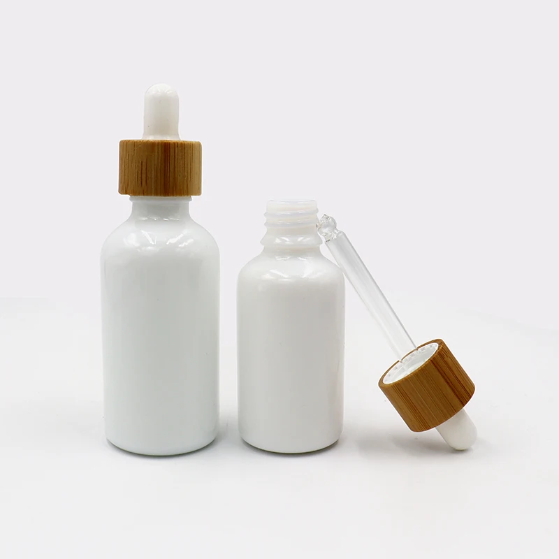 High Quality Dropper Bottle Empty Essential Oil for Face Skincare Black Amber Frosted Glass Dropper Bottle with Bamboo lid