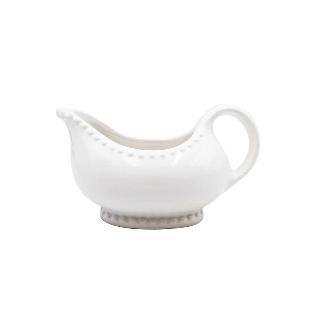 Wholesale cheap embossed dot White Easy-Pour Ceramic sauce Gravy Boat with