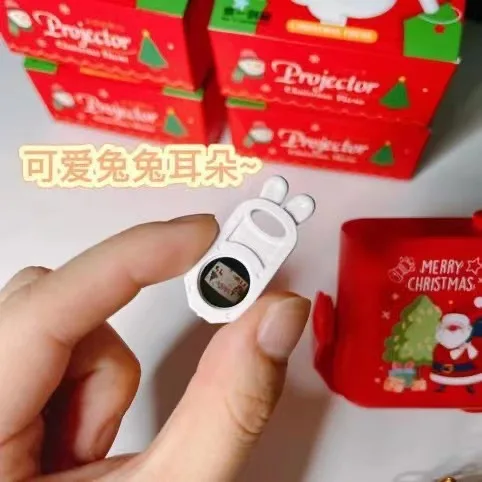 Hot toys Christmas theme projector cheap electric projection machine toy with 5 slides landscape toy projector manufacturer