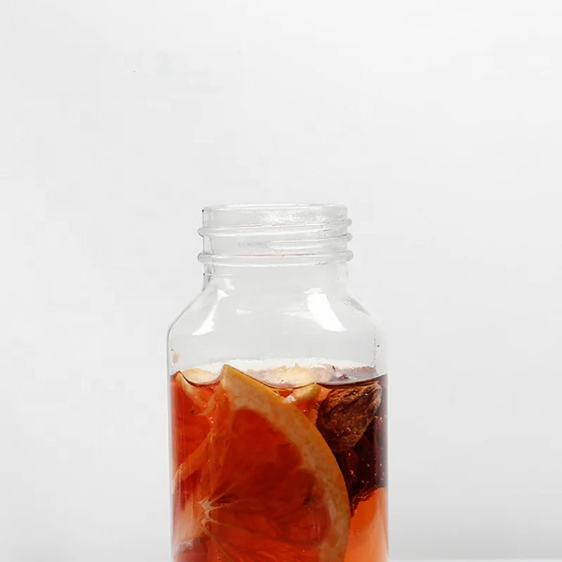 Wholesale fruit infuser glass water bottle 300ml 500 ml empty glass voss water bottle with custom logo