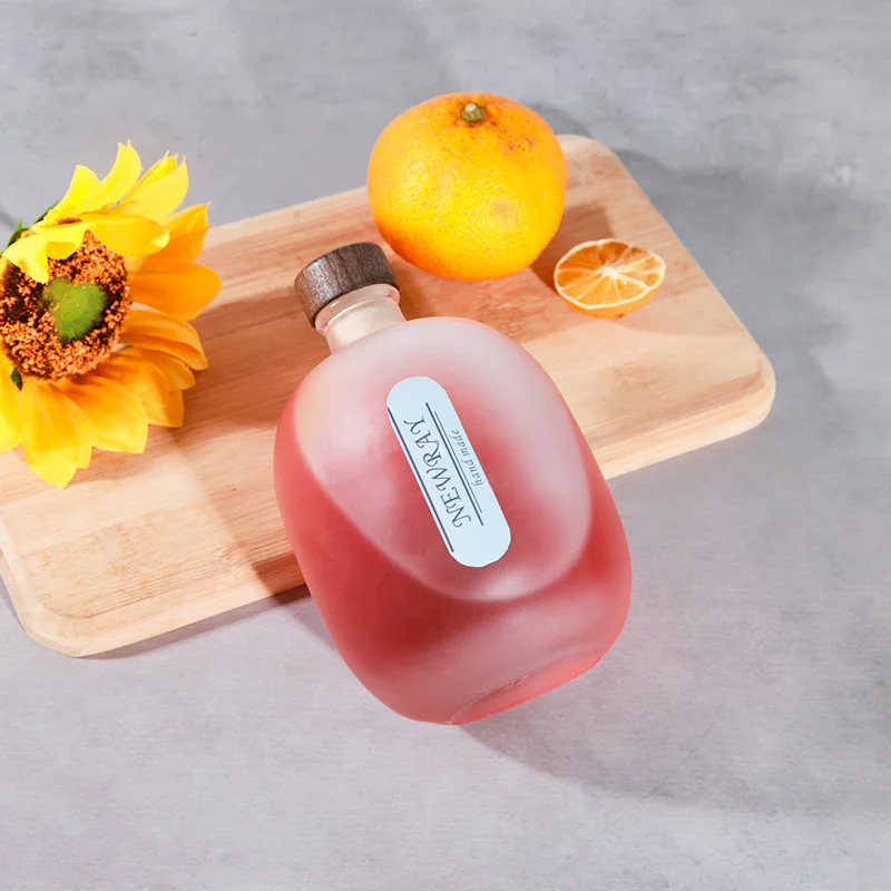 High Quality Empty 100 ml 250 ml 500 ml Round Frosted Transparent Glass Bottles for for Beverage Juice Coffee with Corks