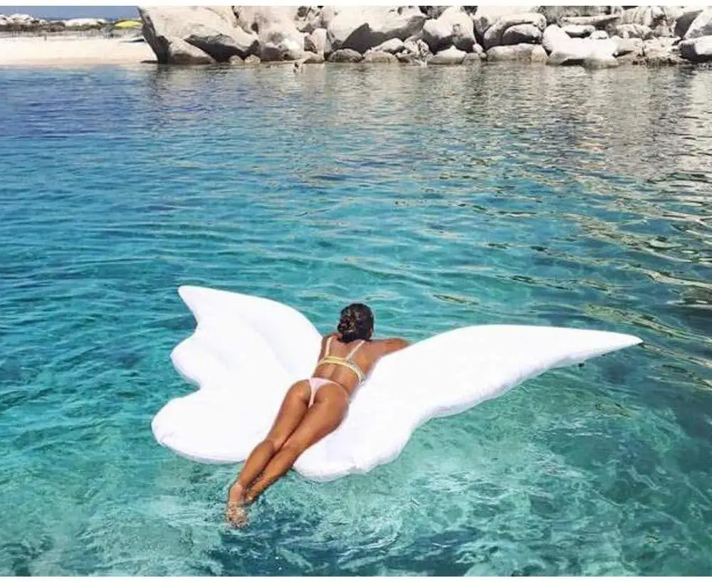 Inflatable butterfly wings floating on the floating bed angel wings playing in the water floating pad