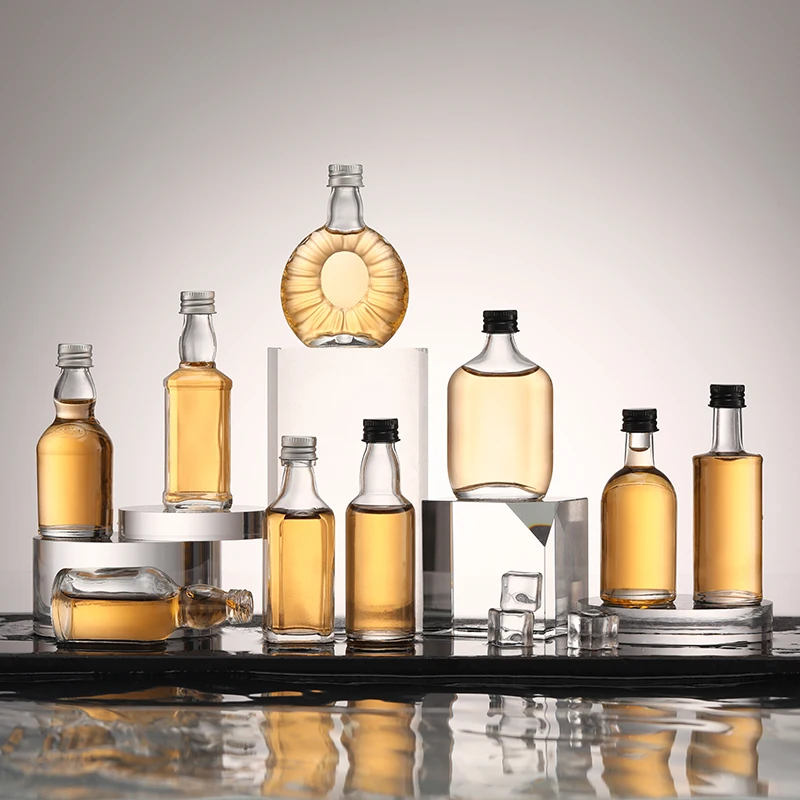 Logo Custom 50ml 100ml Wholesale Empty Mini Liquor Glass Shot Bottles With Aluminum Cap For Liquor