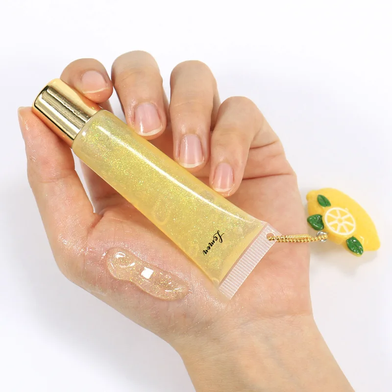 Strawberry Private Label Custom Logo 24 Hours Long Lasting Lip Gloss Vegan Cruelty Free Colored Fruit Lip Oil with Shimmer