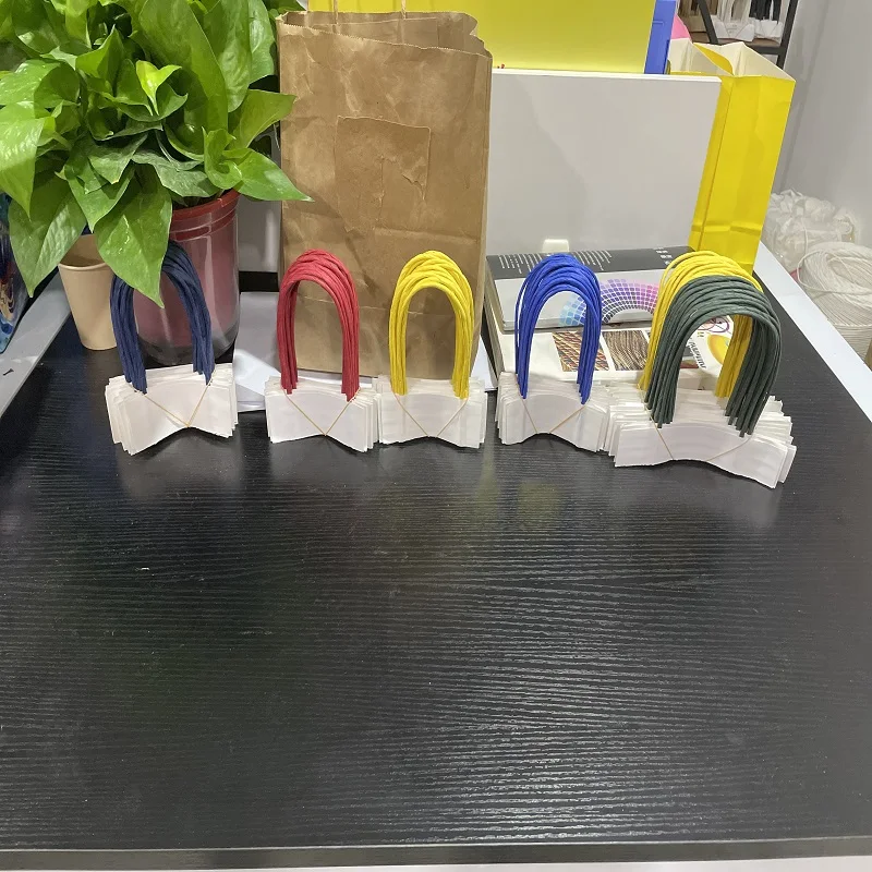 Customized cowhide shopping bag handle with white twisted rope for paper bags