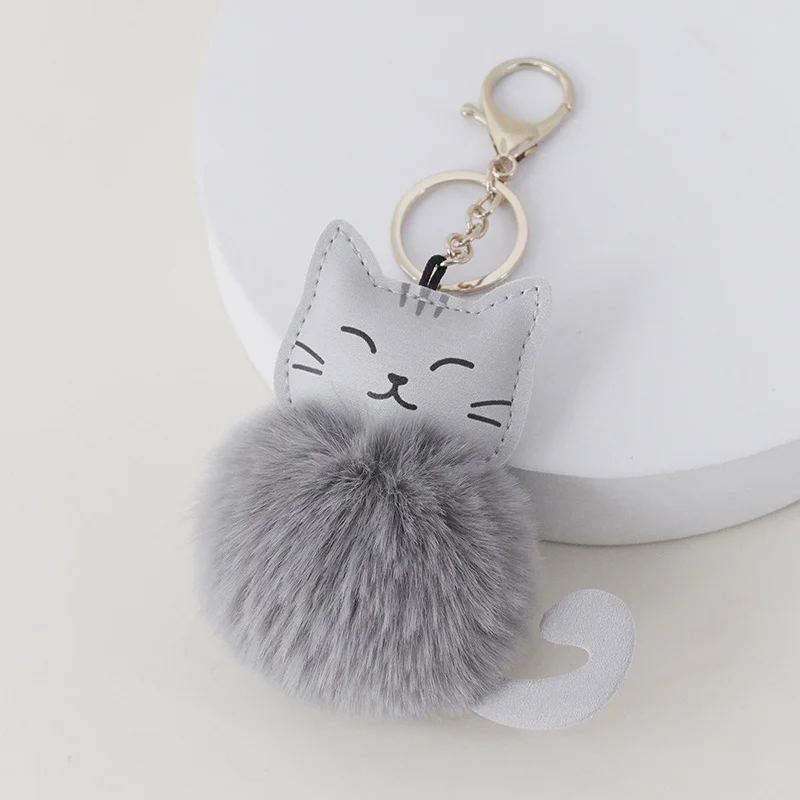High-quality cute leather cat tiger fur ball keychain luggage car decoration accessories all-match pendant holiday gifts