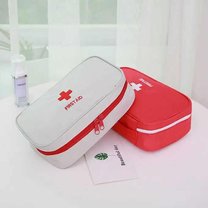 first aid kit for home or travel emergency care red fabric first aid bag