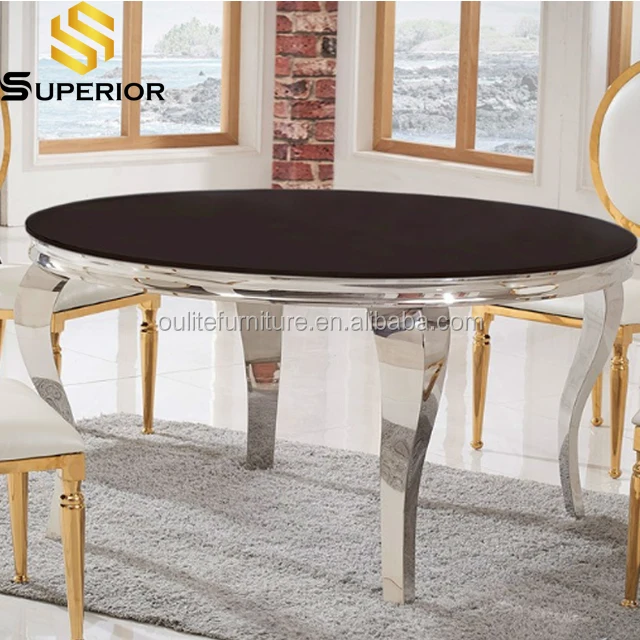 round serpentine feet metal frame dining table modern style