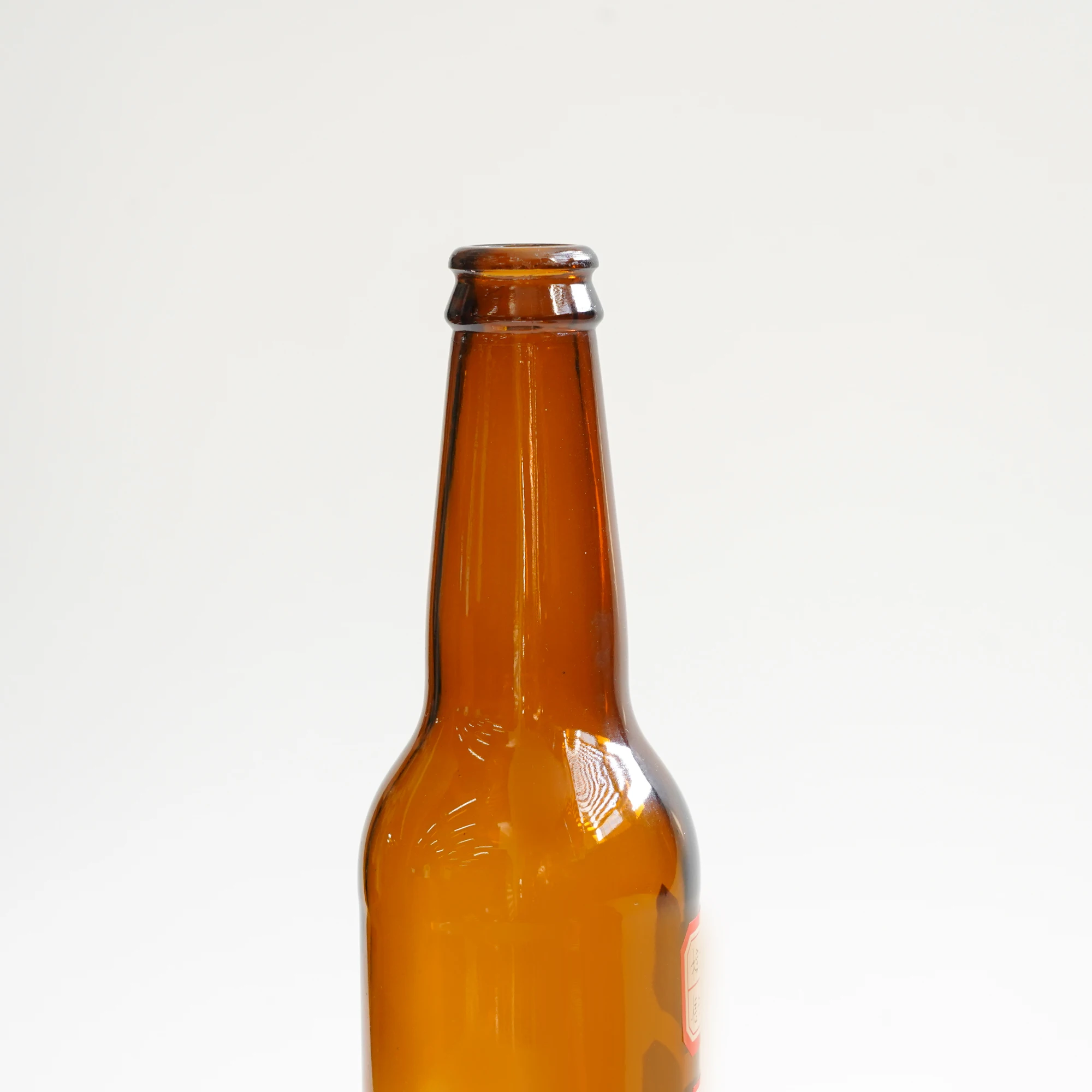 Оптовая продажа стеклянных бутылок для пива 330 мл янтарная прозрачная пивная бутылка на заказ
