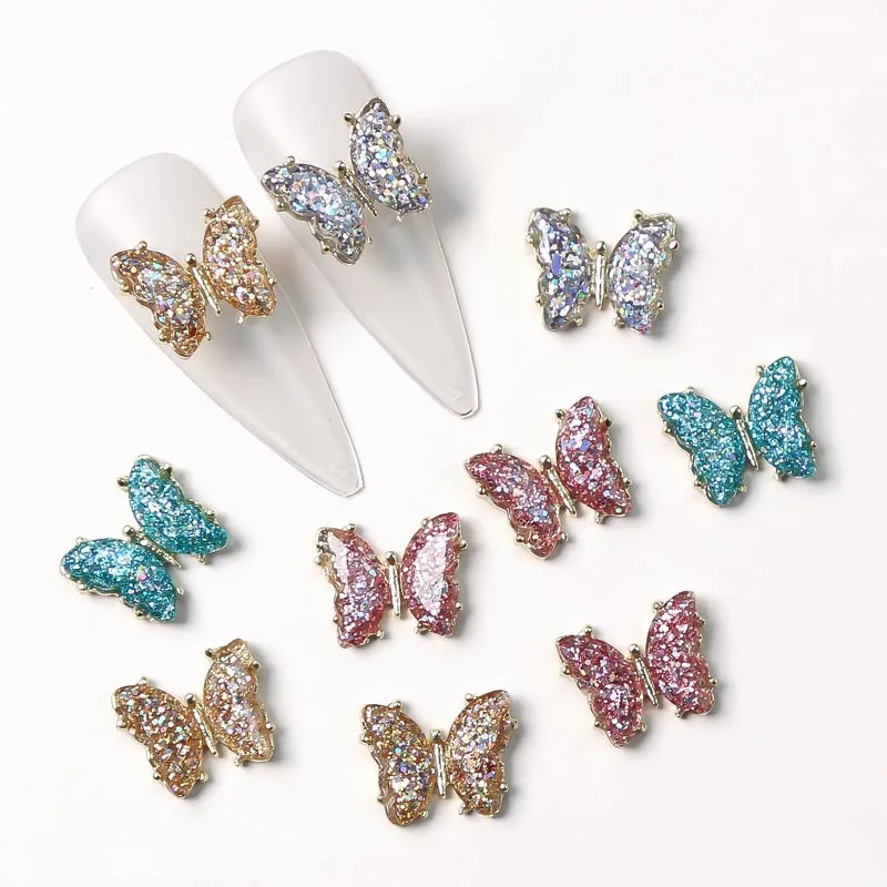 Factory Price Aurora Colorful Butterfly Nail Rhinestones 3D Metal Alloy Silver Bows Nail Art Charm Decoration Supplies