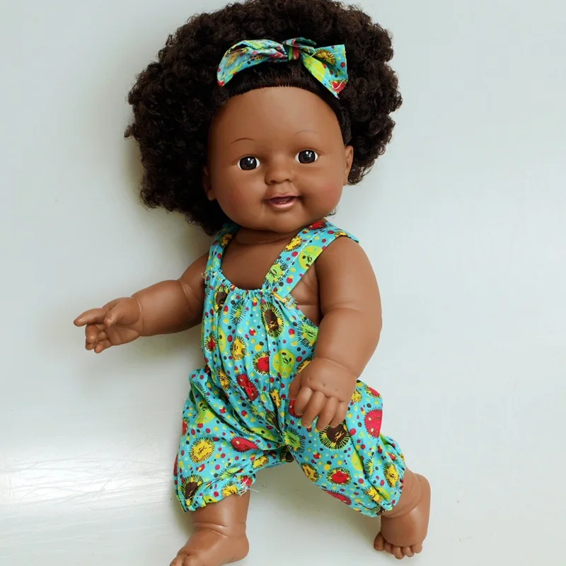 A 30 cm African doll with an afro head that speaks vocally